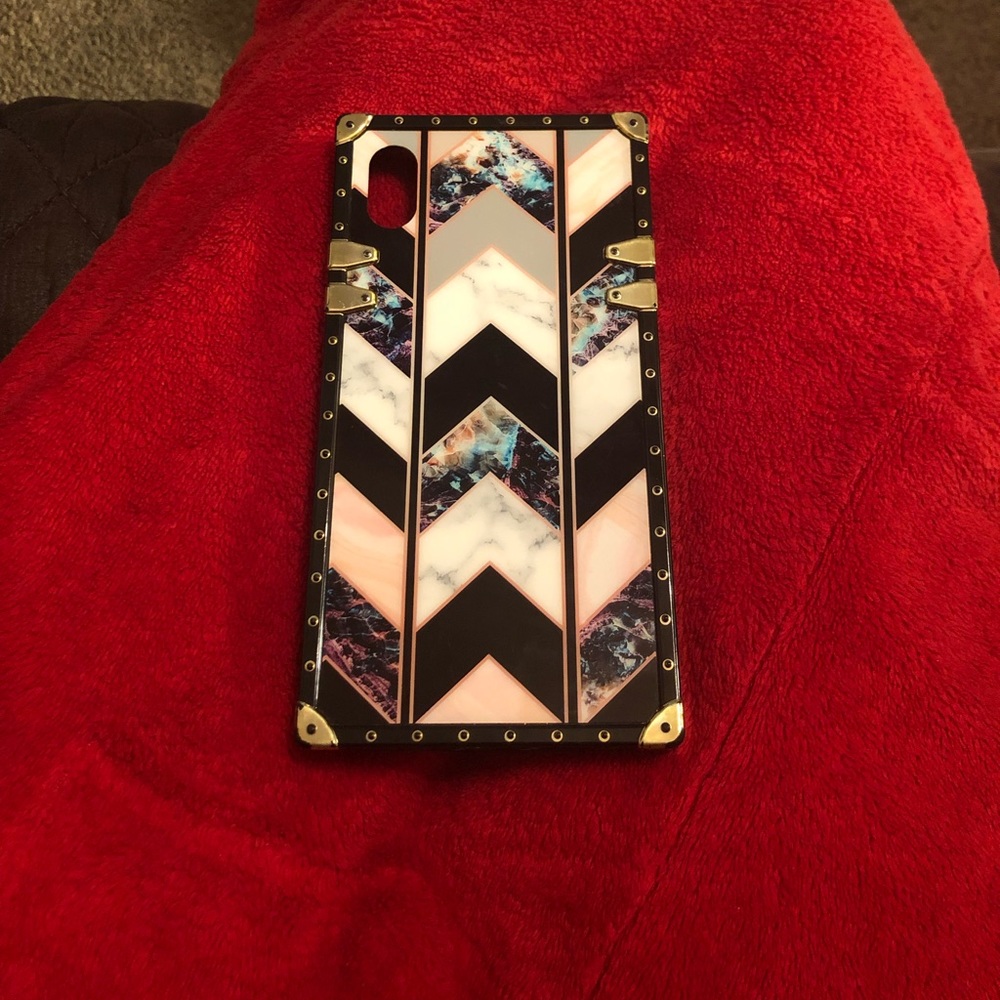 iPhone XR blue, pink, white, and black arrow print phone case.